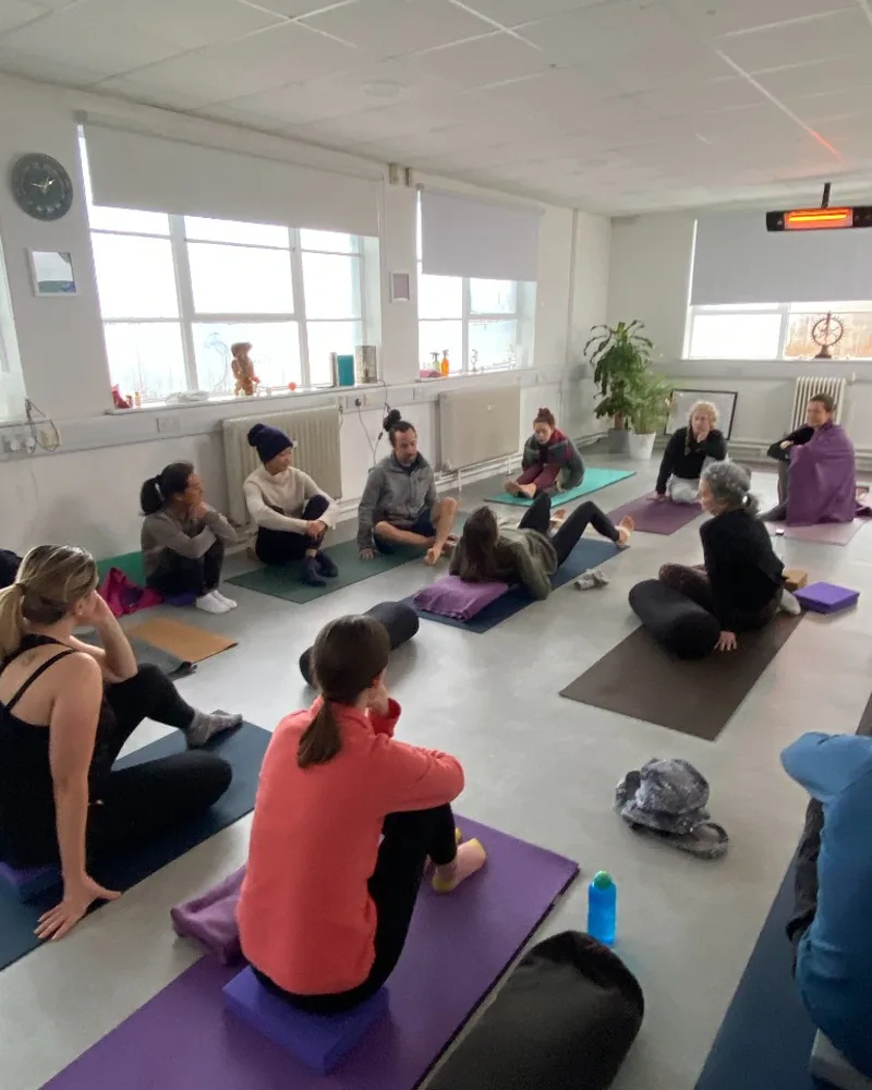 Raili Maripuu and Katia Major leading 200-hour Foundation Training classroom practice at Thames Wellness Academy